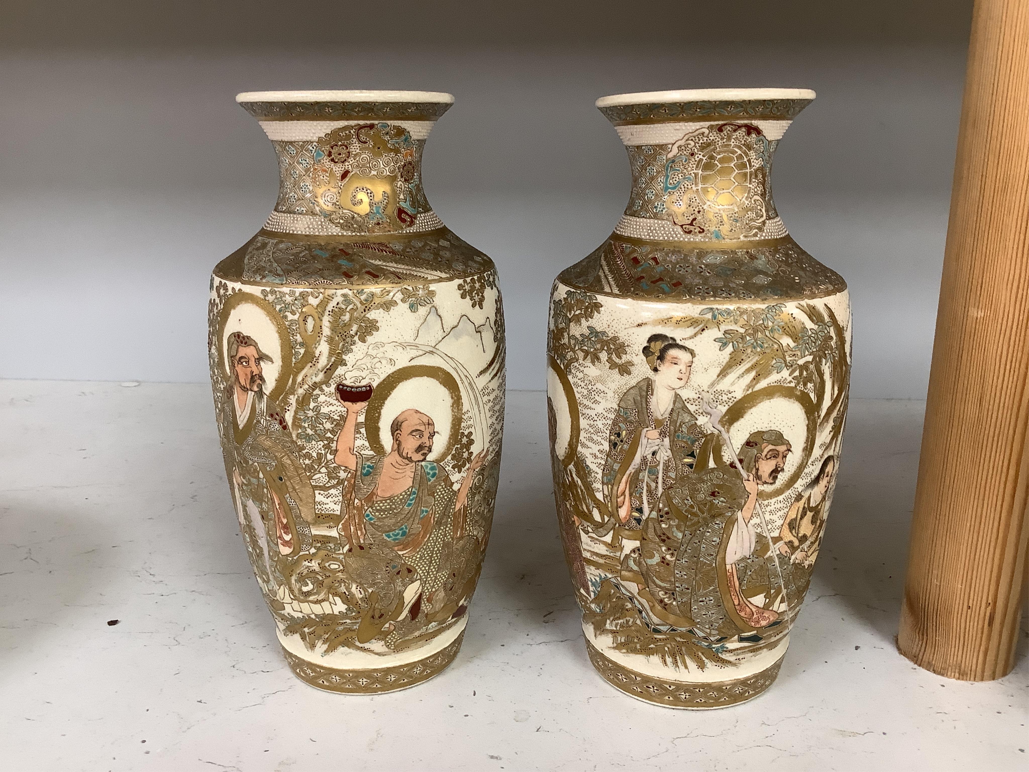 A pair of Japanese Satsuma ‘rakan’ vases, Meiji period, 21cm